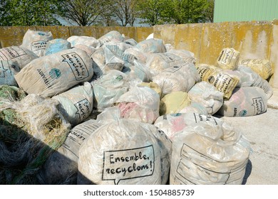 Normandy, France, May 2010.
Recycling Agricultural Plastics Waste And Silage Bags, Plastic Tarp, Plastic Tarpaulin, Plastic Twine, Net Wrap, Bottles And Other Plastic Farm Products