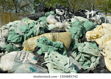 Normandy, France, May 2010.
Recycling Agricultural Plastics Waste And Silage Bags, Plastic Tarp, Plastic Tarpaulin, Plastic Twine, Net Wrap, Bottles And Other Plastic Farm Products