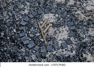 Norse Rune Fehu On Ashes Backgorund Inside The Circle Of 24 Norse Runes