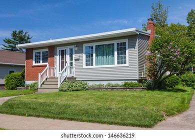 North America Sixties Era Wooden Bungalow  In Suburbia.