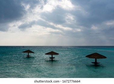 North Malé Atoll, Maldives - December 29 2019 - Umbrellas On The Water