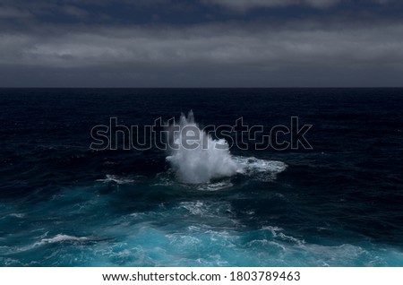 North coast of Gran Canaria, Canary Islands, Banaderos area, strangely shaped wave, resembling underwater explosion,  formed by a clash of incoming and reflected waves