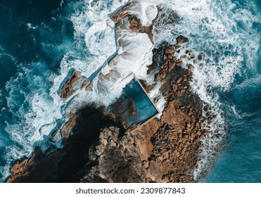 North Curl Curl rock pool with incoming waves. - Powered by Shutterstock