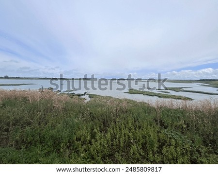 Similar – Lahnungen coastline barge