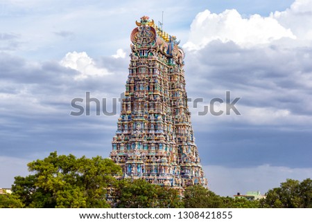 The north gopuram of the Meenakshi temple in Madurai, India. A Gopuram is a monumental gatehouse tower, usually ornate, at the entrance of a Hindu temple usually found in the southern India