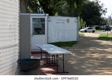 North Hollywood, CA USA - May 28, 2021:  Security Guard At Alexandria Park Tiny Home Village For Homeless People On Laurel Canyon Blvd