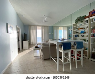 North Hutchinson Island, FL/USA -10/9/20:  A Beach Themed  Dining Room And Living Room In A Condominium Complex In Florida.