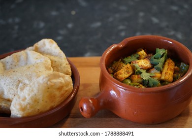 North Indian Spicy Vegetarian Kadhai Paneer Cuisine Served With Puri