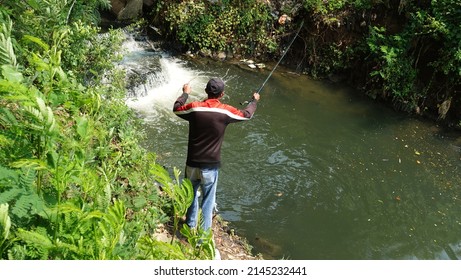 North Jakarta, Indonesia - April, 12, 2022: Fishing In Pluit Reservoir Park.