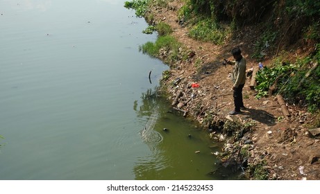 North Jakarta, Indonesia - April, 12, 2022: Fishing In Pluit Reservoir Park.