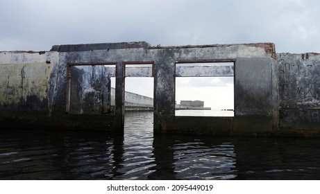 North Jakarta, Indonesia - Dec, 23, 2021: Wal Adhuna Mosque In North Jakarta Due To Global Warming Experienced A Decrease In Land And Sea Level Rise.