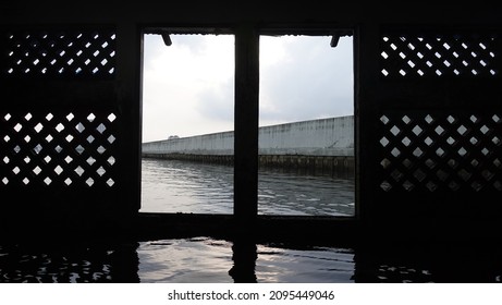 North Jakarta, Indonesia - Dec, 23, 2021: Wal Adhuna Mosque In North Jakarta Due To Global Warming Experienced A Decrease In Land And Sea Level Rise.