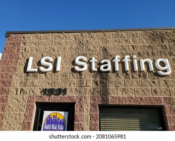 North Kansas City Missouri USA - November 18 2021: Sign Above Building Entrance For LSI Staffing Beneath Blue Sky