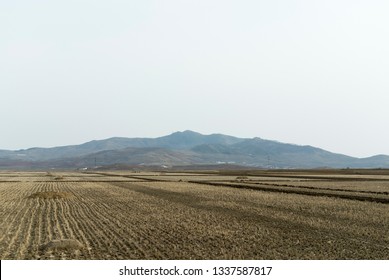 North Korea APRIL 17 2013: Spring Drought Rice Fields Landscape In North Korea