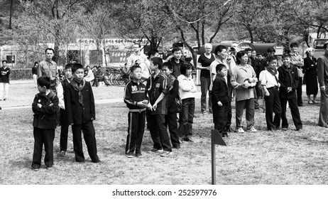 NORTH KOREA - MAY 1, 2012: Pioneer children in the park due to the celebrating of the Internationa Worker's Day in N.Korea, May 1, 2012. May 1 is a national holiday in 80 countries