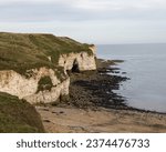 North Landing, Flamborough UK showing white cliffs and sea caves