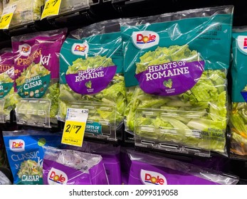 NORTH PORT, FL - January 01, 2022 : Dole bagged romaine salad lettuce on display at local grocery store.
