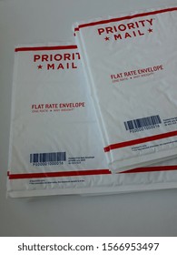 North Port, FL/ USA - November 21, 2019 - USPS  Priority  Mail  Flat Rate Envelopes  On White Background.