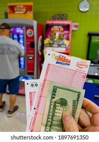 NORTH PORT, FLORIDA - January 19, 2021 : Purchasing Lottery Tickets For The Florida Mega Millions And Powerball Lotto.