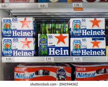 NORTH PORT, FLORIDA - SEPTEMBER 15, 2021: Heineken 0.0 Beer Can And Bottle Packaging On Retail Cooler Shelf. Heineken 0.0 Contains Less Than .03% Alcohol So As Such It Is A Non-alcohol Beer.