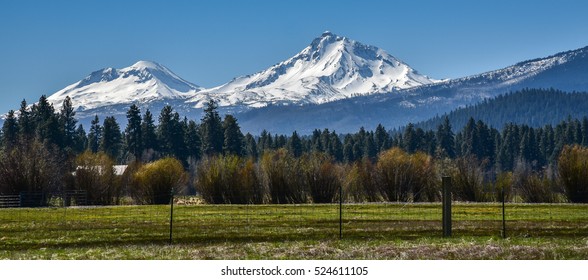 The North Sister and Middle Sister mountains in the Oregon Cascade Range as viewed from the Black Butte Ranch in Central Oregon.