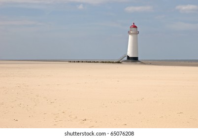 North Wales Lighthouse On Deserted Beach