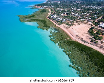 The North West City Of Broome In Western Australia Offers Up Some Of The Most Vibrant Landscapes In The Country. This Aerial Shows Off A Stunning Red Landscape Surrounded By Amazing Turquoise Water. 