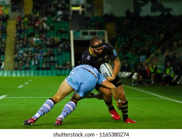 Northampton, UK. 24th August 2018. Will Davis Of Northampton Saints Is Tackled By Adam Nicol During The Pre-Season Friendly Game Between Northampton Saints And Glasgow Warriors At Franklins Gardens.