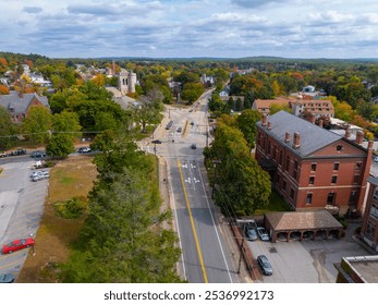 Northbridge town hall aerial view at 7 Main Street in fall with foliage in historic village of Whitinsville, town of Northbridge, Massachusetts MA, USA. 