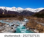 Northern Alps and melting snow river, Hakuba Village, Nagano Prefecture