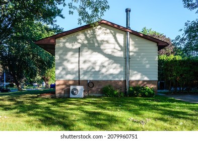 Northern Climate Home With Multiple Heating Sources Of A Wood Buring Fireplace And Electric Heat Pump.