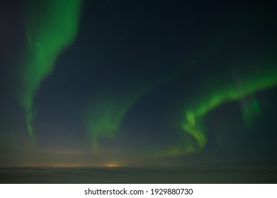 Northern Light On The Silent Field Before Sun Rise.