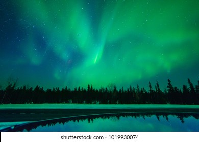 Northern Lights ,Aurora Borealis, Green, Purple, Blue, Stars. North Pole, Iceland, Russia