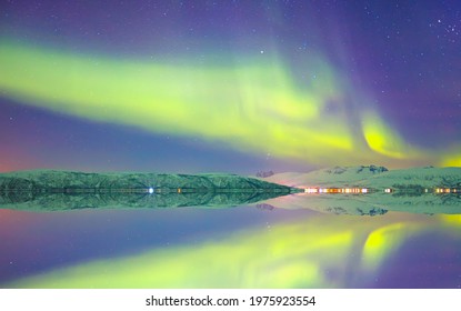 Northern Lights Or Aurora Borealis In The Sky Over Tromso Fjords - Tromso,  Norway