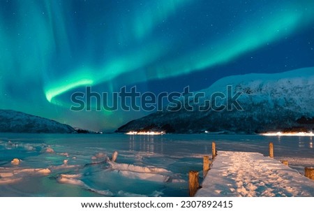 Northern lights or Aurora borealis in the sky over Tromso, Norway
