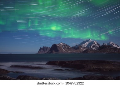 Northern Lights, Aurora Borealis With Star Trails Over The Rocky Mountains, Scenic Night Landscape, Lofoten Islands, Norway