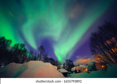 Northern Lights During Winter Time At Night In Camper Trailer Park In Tromsø, Norway