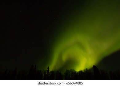 Northern lights over Lapland - Shutterstock ID 656074885