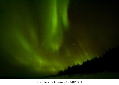 Northern lights over Lapland - Shutterstock ID 657481303