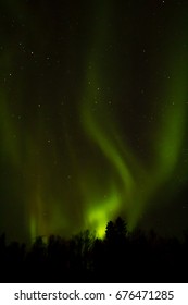 Northern lights over Lapland - Shutterstock ID 676471285
