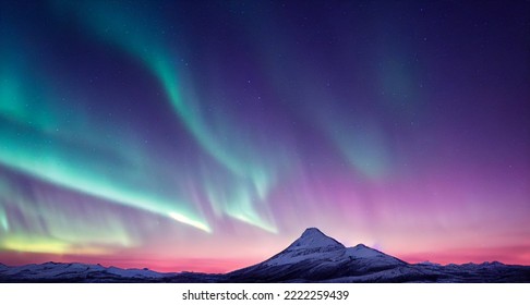 Northern Lights over snowy mountains. Aurora borealis with starry in the night sky. Fantastic Winter Epic Magical Landscape of snowy Mountains.   - Powered by Shutterstock