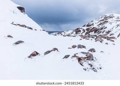 northern polar landscapes in the Teriberka Nature Park on the shore of the Barents Sea, Murmansk, Russia - Powered by Shutterstock