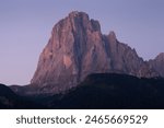 The northern side of Sasso Lungo at sunrise from the Val Gardena area