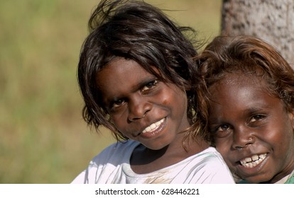 NORTHERN TERRITORY, AUSTRALIA - JUNE 03 2009: A portrait of two beautiful young aboriginal kids with smiling faces.