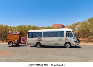 NORTHERN TERRITORY, AUSTRALIAN - OCTOBER 22: A Tour Bus From Alice Springs Close To Uluru In The Northern Territories In Australia.