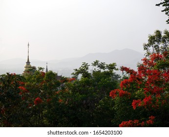 Northern Thai Pagoda In Distant, A Smoggy Sky