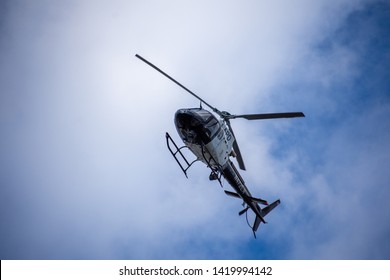 Northridge, CA / United States -  May 27, 2019: LAPD Air Unit and Patrol Units respond to brandishing/ADW call in suburban neighborhood.