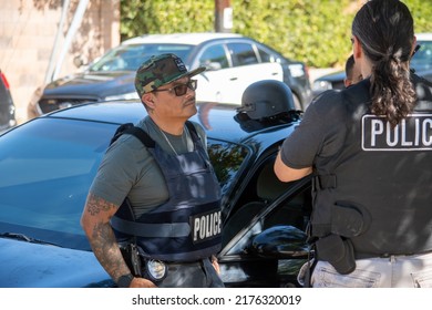 Northridge, California, United States -  June 29, 2022: A Multi-agency Task Force Including LAPD Narcotics Detectives Stages On A Community Street Prior To A Drug Policy Enforcement Raid.