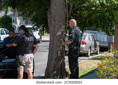 Northridge, California, United States -  June 29, 2022: A Multi-agency Task Force Including LAPD Narcotics Detectives Stages On A Community Street Prior To A Drug Policy Enforcement Raid.