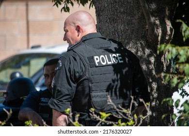 Northridge, California, United States -  June 29, 2022: A Multi-agency Task Force Including LAPD Narcotics Detectives Stages On A Community Street Prior To A Drug Policy Enforcement Raid.